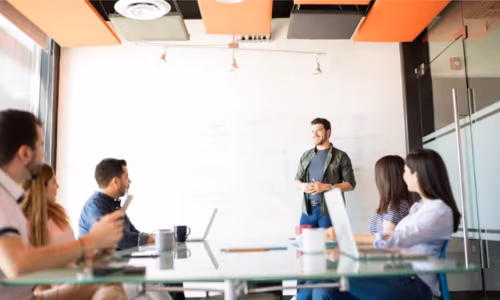 Marketing leader presenting a budget request to the executive team framed around business outcomes