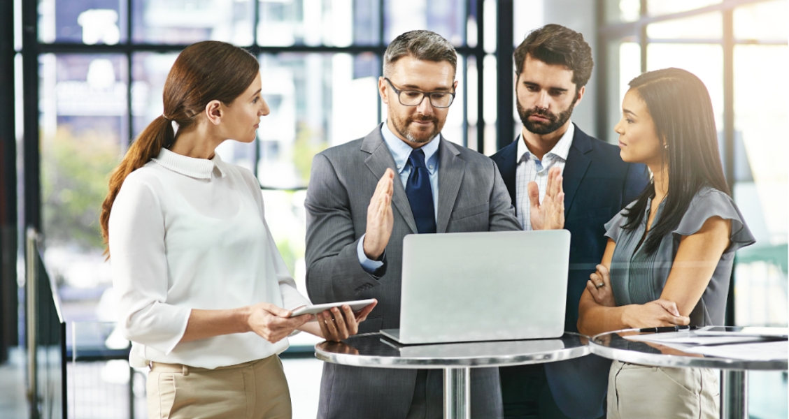 A office team listening a CEO