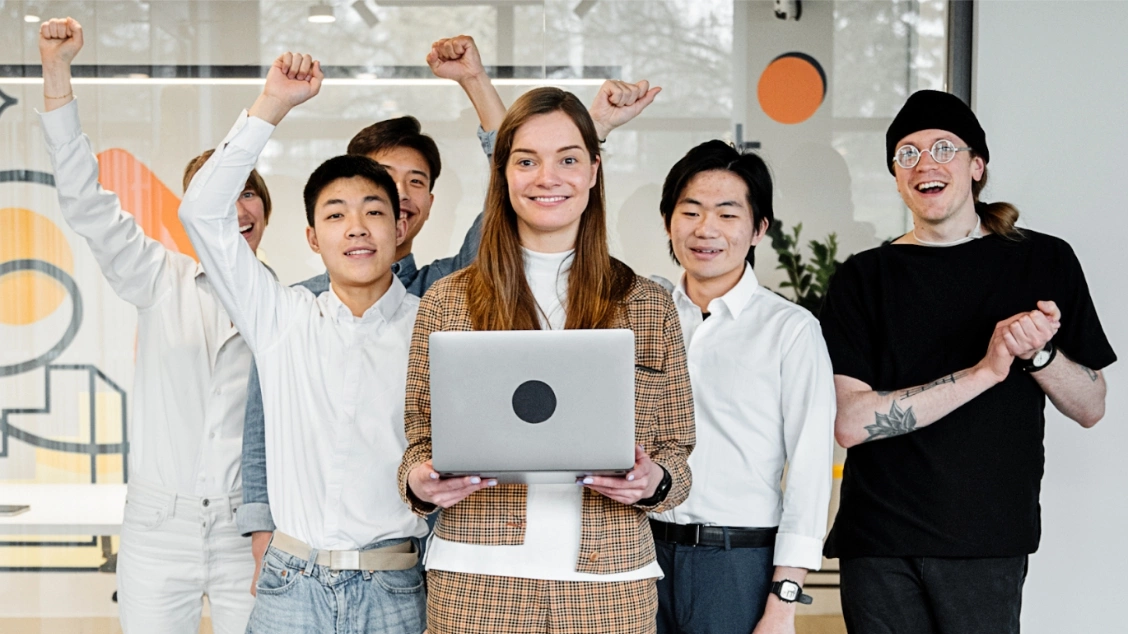 Office employees celebrating