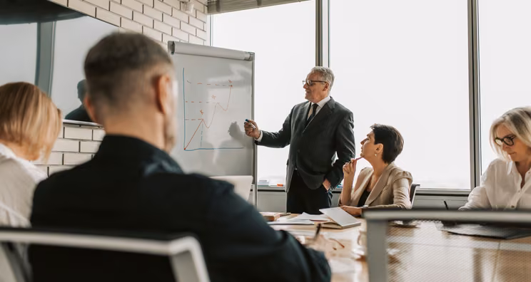 Customer success leader presenting quarterly business review results to an enterprise client
