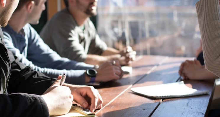 Customer success manager building a client onboarding portal with branded sections and checklists