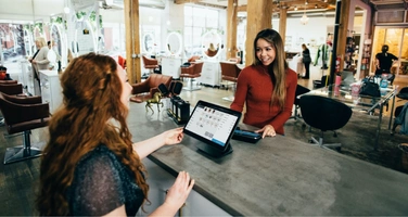 two women doing business in a company